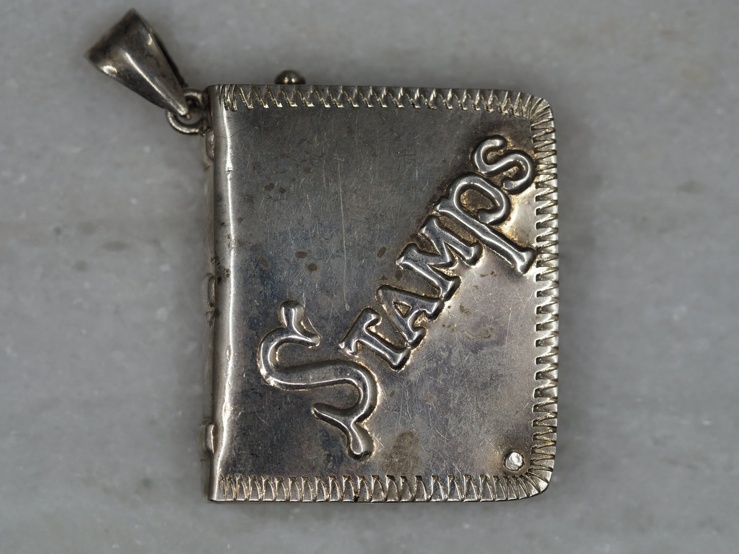 Stamp Book Pendant in Sterling Silver Hudsons Estate Jewellery
