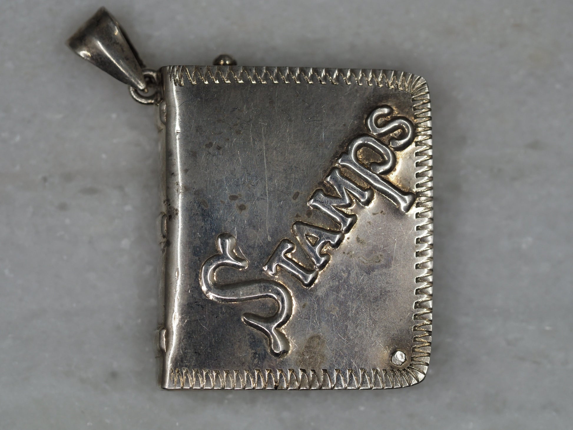 Stamp Book Pendant in Sterling Silver Hudsons Estate Jewellery