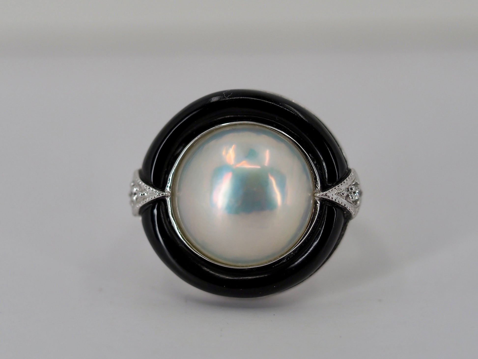 Vintage Mabe pearl, onyx and diamond ring Hudsons Estate Jewellery